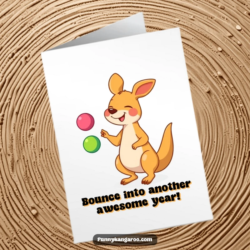 Funny Free Printable Birthday Card: Giggling cartoon kangaroo joyfully juggling colorful balls, ready for a celebration.