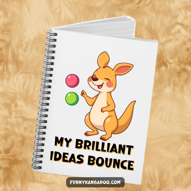 Funny kangaroo notebook featuring a giggling cartoon kangaroo juggling three colorful balls, ideal for jotting down notes and ideas.