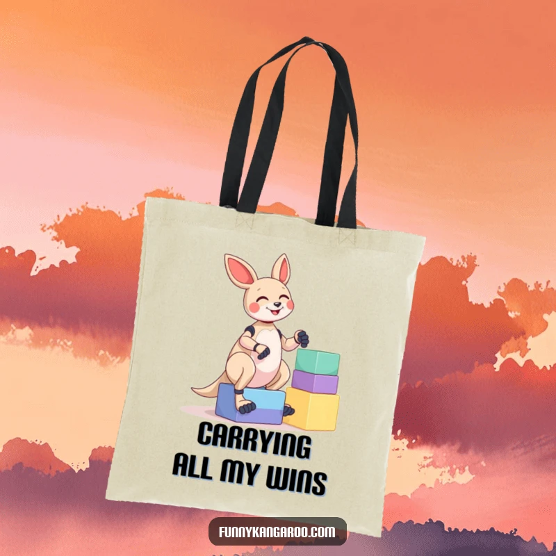 Funny Kangaroo Bot Tote Bag: A giggling kangaroo bot is depicted mid-attempt to balance a precarious stack of colorful, large blocks.